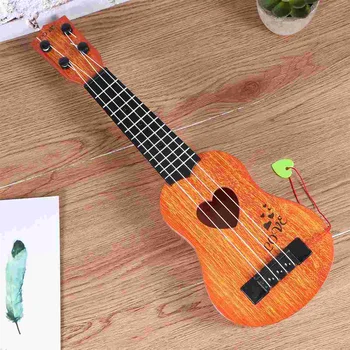Gyermek kis méretű hangszerek utánozták az ukulele mini gitárt négyhúros játékkal